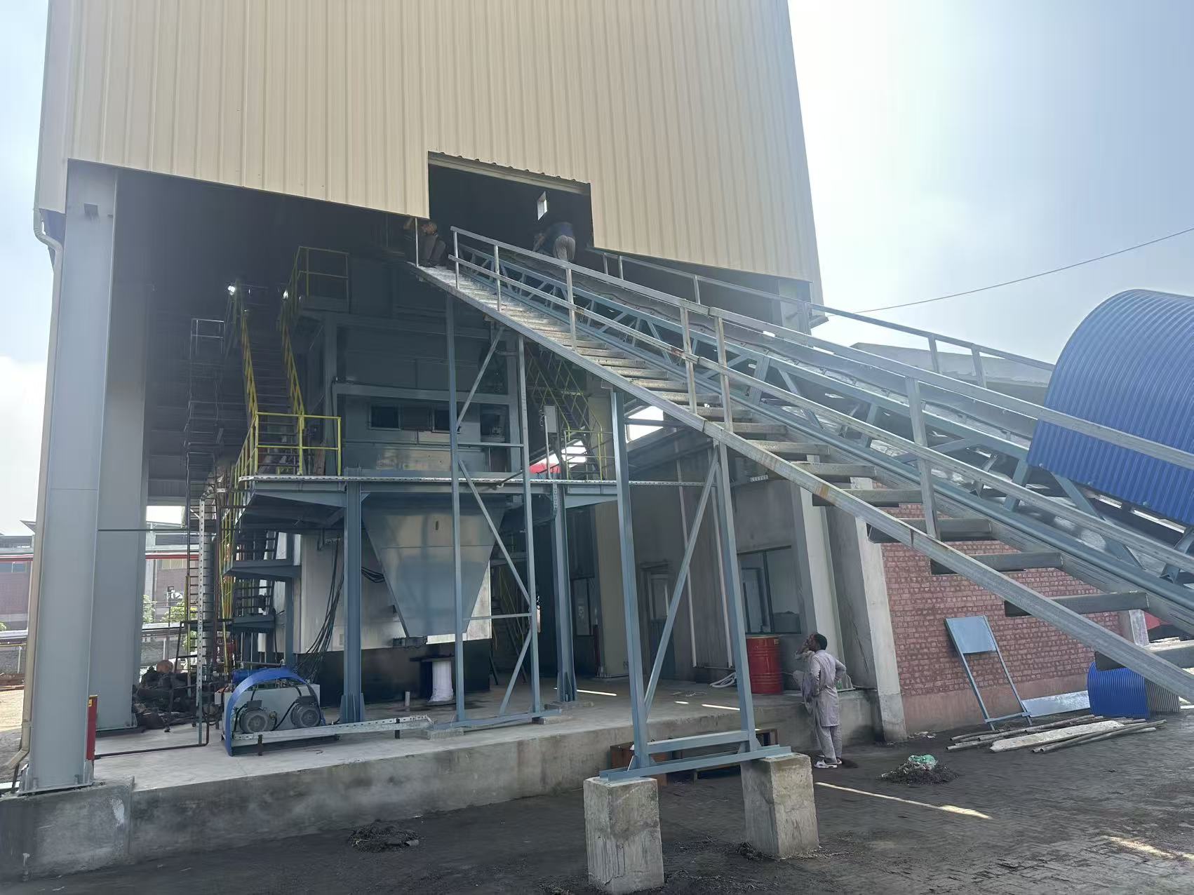 Covered biomass fuel conveyor and installed textile mill heating plant in Pakistan